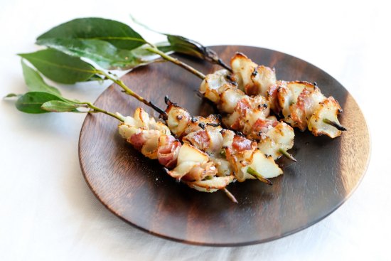 Barbecued blacklip abalone skewers with pancetta at Mimi's.  