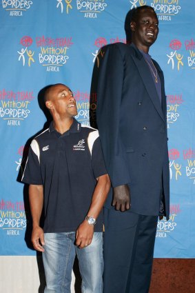 George Gregan, the Wallaby captain meets Manute Bol, the former NBA basketball player who is also 7 feet, 7 inches. 