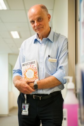 Professor Frank Bowden with his book Infectious.