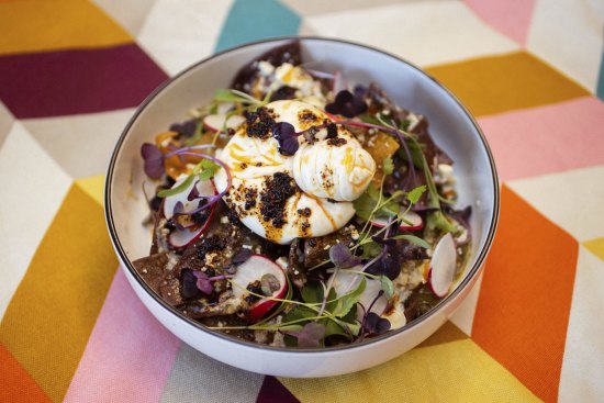 The full Mexican breakfast experience: Burratta chilaquiles (corn chips with burratta topping). 