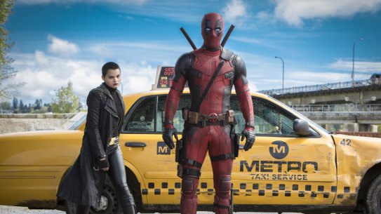 Morena Baccarin, left  and Ryan Reynolds in "Deadpool".