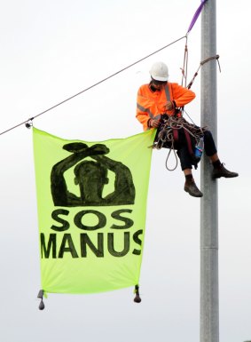 Refugee advocates blockade the entrance to Melbourne's container port on the Footscray Road to call for an end to the  regime on Manus and the detention of all refugees this month.