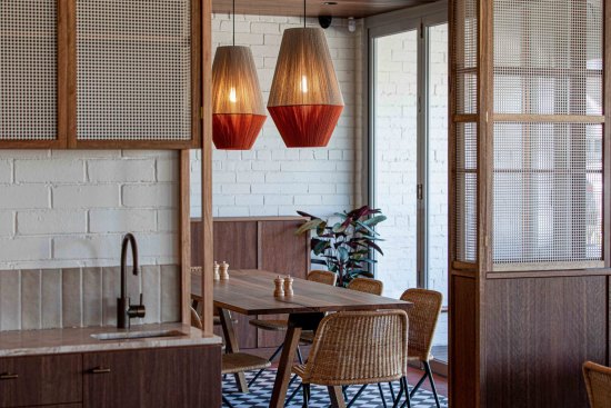 The cafe is broken into various nooks by timber joinery, making a large space feel smaller and warmer.