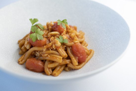 Go-to dish: Casarecce pasta with spanner crab, roast cherry tomato and prawn oil.