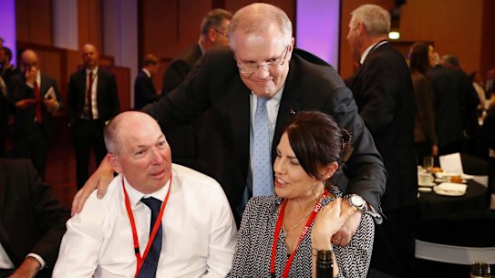 Treasurer Scott Morrison with his brother-in-law Garry Warren and his wife Michelle Warren.