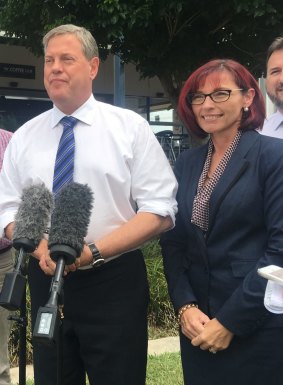 Opposition Leader Tim Nicholls, speaking with new LNP candidate for Springwood Julie Talty, but ended up fending off suggestions the LNP pay back tainted money.