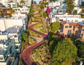 Lombard St is often clogged at either end with tourists taking pictures.