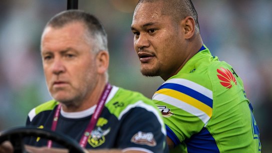 Centre Joey Leilua leaves the field on a medicab on Sunday night.