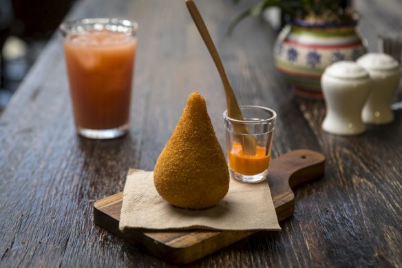 A serve of coxinha, stuffed with chicken and cream cheese. 