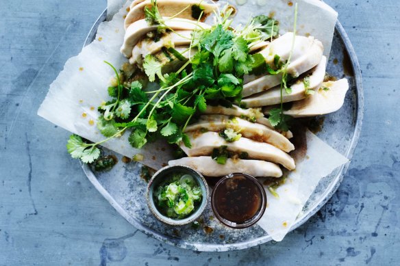 Steamed chicken with green spring onion oil.