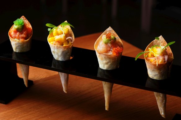 Cute sashimi cones are just the thing with a 'Japerol' spritz.