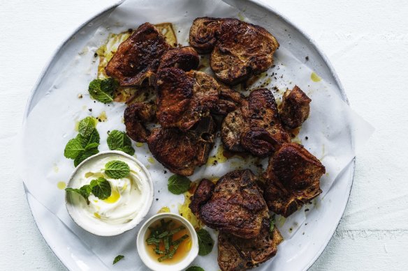 Lamb chops with mint sauce and yoghurt.