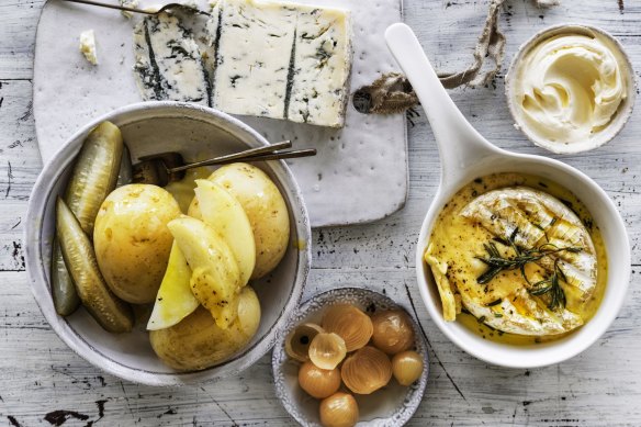 Boiled potatoes with baked camembert.