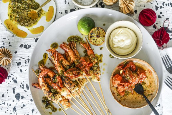 Chermoula prawn skewers with quick tomato relish and aioli.