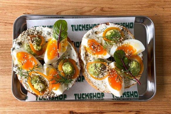 Soft-boiled egg bagel with avocado, dukkah and a caper and dill schmear at Comma Tuckshop, now open in Moorabbin.