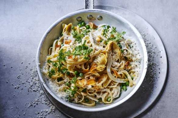 Fast chicken ragu pasta with artichokes and peas.