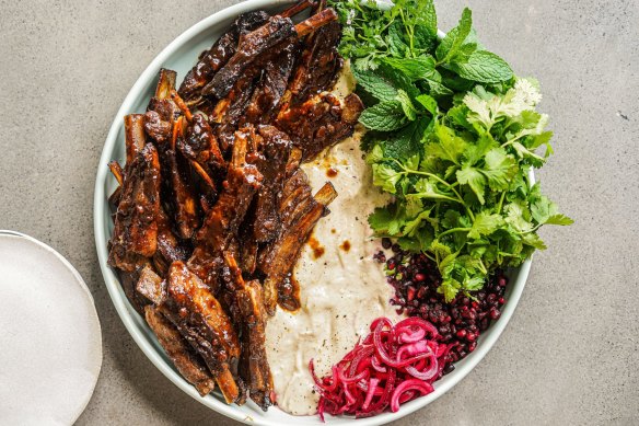 Swipe these sticky lamb ribs through smoky eggplant sauce.