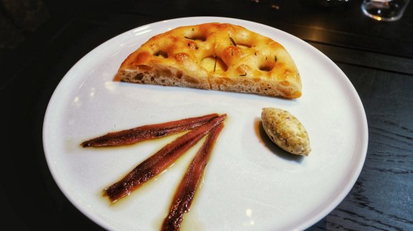 Potato focaccia with Ortiz anchovies and green olive butter.