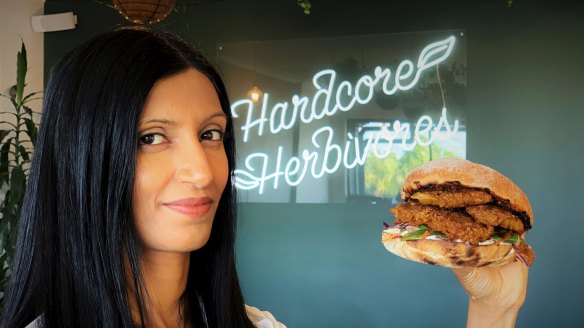 Shama Sukul Lee, the founder of Sunfed, with a burger made using her chicken free chicken product.