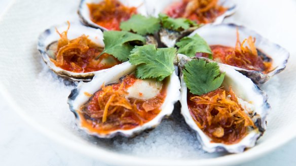 Half dozen oysters with red chilli lime dressing. 
