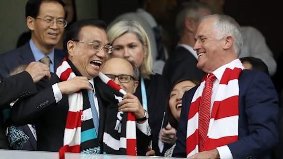 Chinese Premier Li Keqiang and PM Malcolm Turnbull at an AFL match between the Sydney Swans and the Port Adelaide in March.