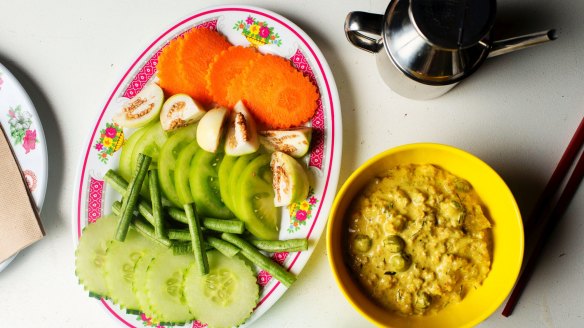 Prahok k'tis (pork and dried fish dip) with raw vegetables.