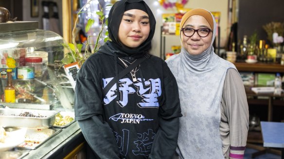 Alimah Vilda (left) with her granddaughter Amalul Binte from Island Dreams Cafe in Lakemba.
