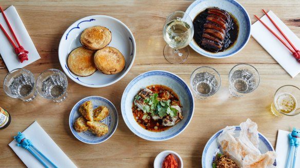 Clockwise from top left: Mapo tofu jaffles, moy choy (pork belly with mustard greens), pepper beef tartare, steamed barramundi, and fried dumplings.