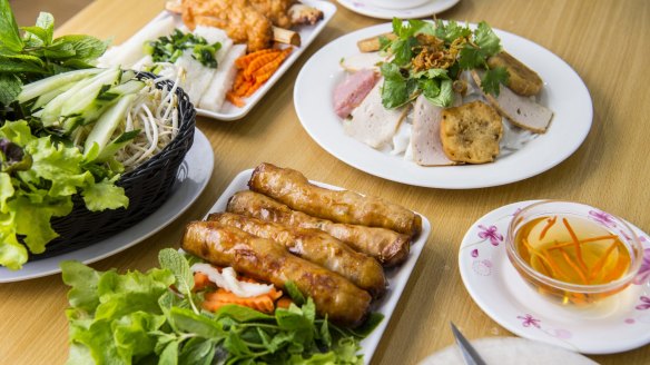 Spring rolls, sugar cane prawns and fresh rice pastry with fresh herbs and dipping sauce at Phu Quoc, Cabramatta. 