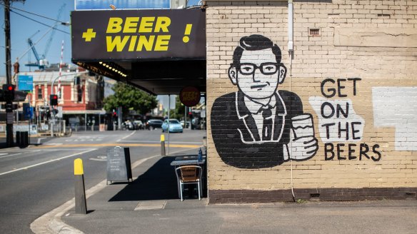 The Daniel Andrews mural on the exterior of Holmes Hall and Fizz & Hop.