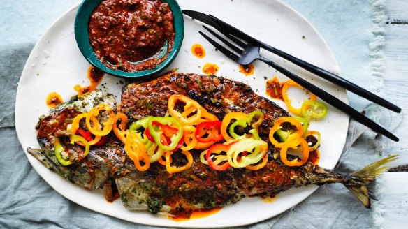 Chermoulas and lime-cured peppers give a kick to this grilled oily fish.