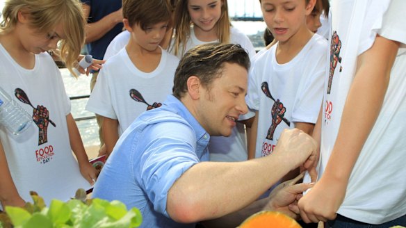 Jamie Oliver takes his message of healthy eating for children to Sydney Opera House earlier this year.