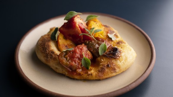 Go-to dish: Catalan coca, featuring tomatoes on a springy sourdough base.