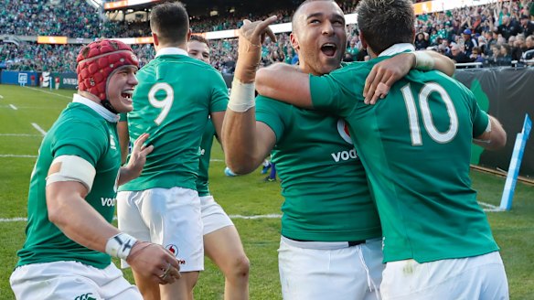Stunning: Ireland celebrate after scoring against the All Blacks.
