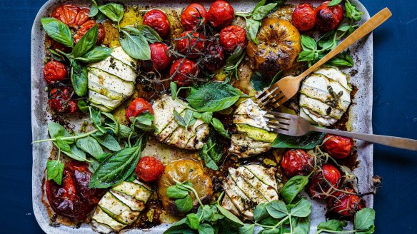 Bundles of joy: Tomato traybake with zucchini cheese parcels.