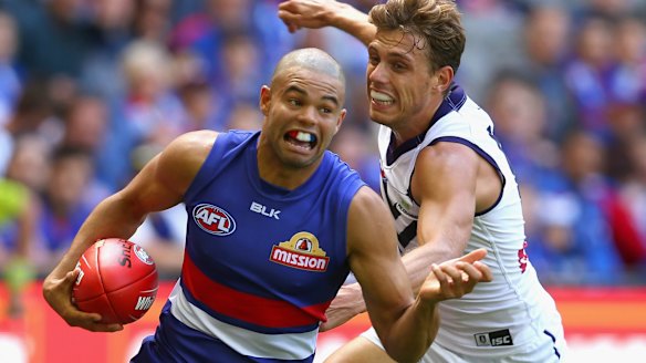 Jason Johannisen gets past Tom Sheridan.