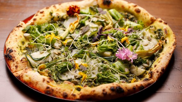 Red Sparrow's Supergreen pizza topped with pesto, zucchini, broccolini and pepitas has flown southside.