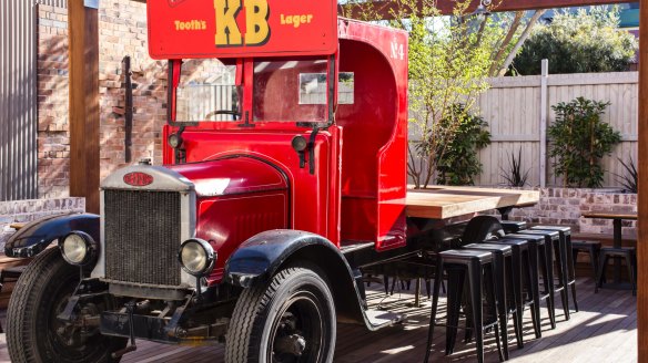 A 1926 beer delivery truck has been converted into a table.