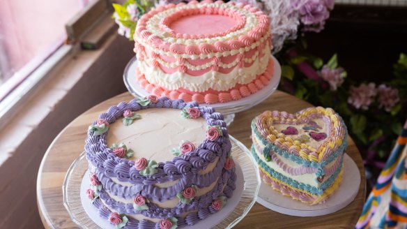 Buttercream ruffles, heart-shaped sponge and glitter-coated cherries are the order of the day at Le Petit Cafe Rose in Yarraville.