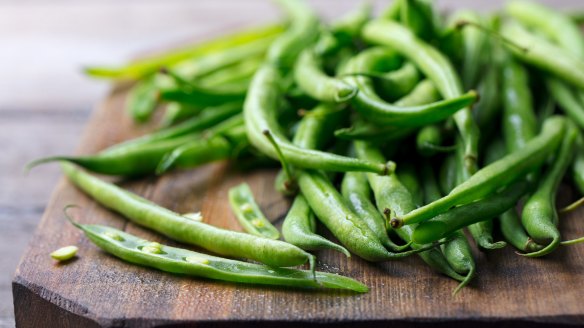 Cooking beans in plenty of boiling water helps them stay green.