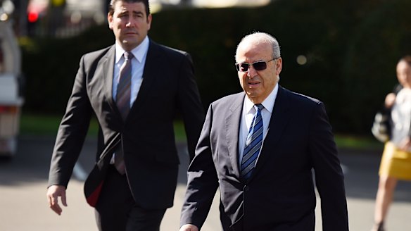 Former Labor minister Eddie Obeid (right) arrives at the Supreme Court in Darlinghurst on Wednesday. 