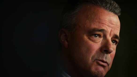 Dr Brendan Nelson  becomes emotional  during a press conference as he announces his resignation from the federal Parliament.
