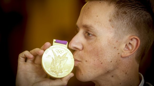 Jared Tallent with his gold medal on Friday.