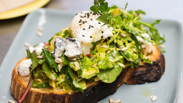 Savoury toast with raw shaved brussels sprout, lemon zest, chilli, toasted at Two Chaps.