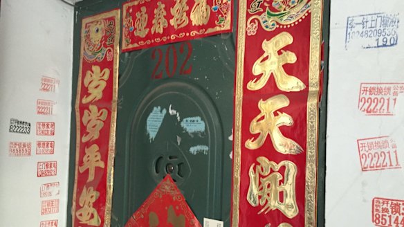 'We are being monitored': The door of the apartment in Ulanhot, Inner Mongolia, where Bao Zhuoxuan is staying with his grandmother. 