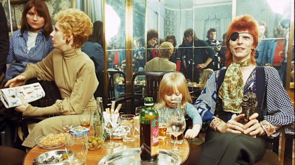 Angie Bowie, Zowie Bowie (Duncan Jones) and David Bowie (wearing an eyepatch) appear at a press conference at the Amstel Hotel on 7th February 1974.