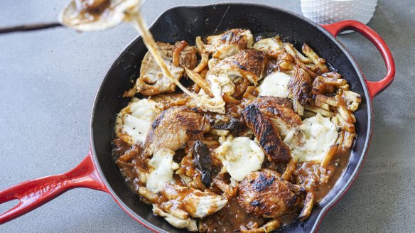 Poutine with chicken, chips and gravy.