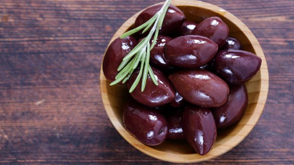 Snack on marinated olives.