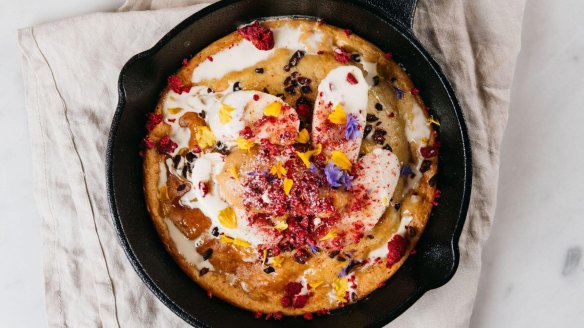 Ricotta hotcakes with banana, dulce leche butter, freeze-dried raspberries and cocoa nibs at The Goodsline.