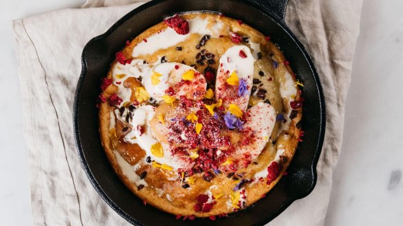 Ricotta hotcakes with banana, dulce leche butter, freeze-dried raspberries and cocoa nibs at The Goodsline.